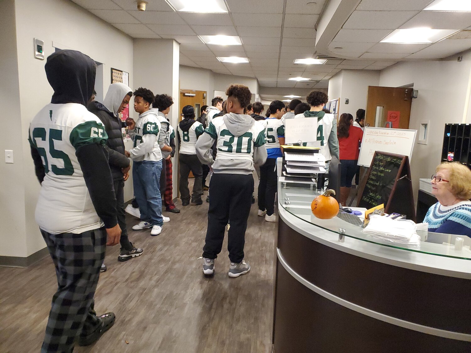 GO THUNDERBOLTS: Cranston East players fill the halls of the Senior Center.